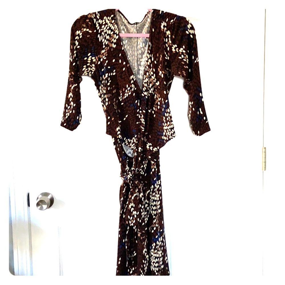 Wrap dress with brown, cream, and blue pattern